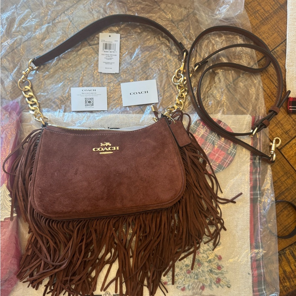 Coach chocolate brown suede fringe Teri with gold extenders